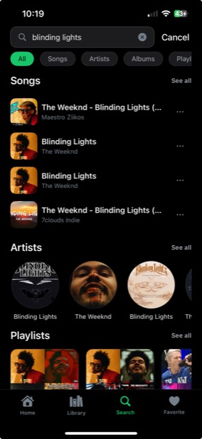 Tunora Search results with filters for Songs, Artists, Albums and Playlists.